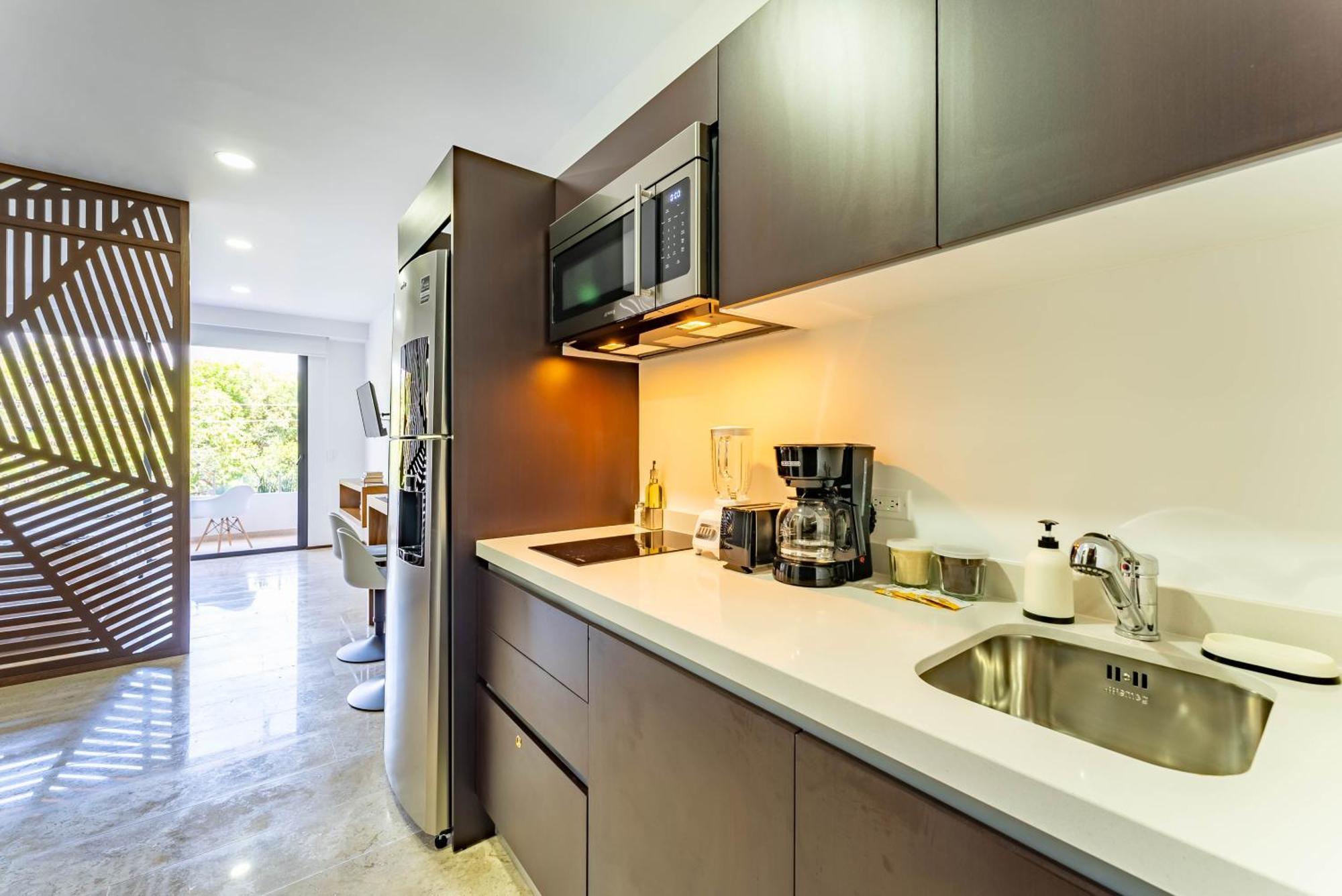 Menesse Apartments ตูลุม ภายนอก รูปภาพ